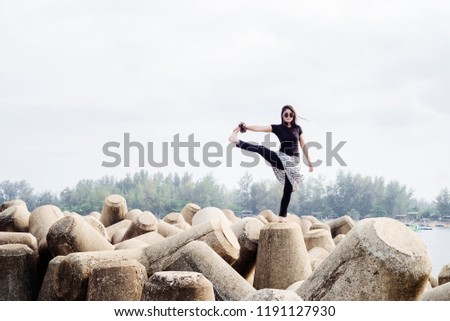 Similar – Junge Sportlerin beim Springen auf die Straße