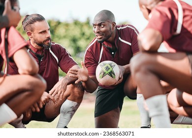 Fitness, huddle and rugby team on a field planning a strategy for a game, match or tournament. Sports, diversity and captain talking to group at training, exercise or practice on an outdoor pitch.