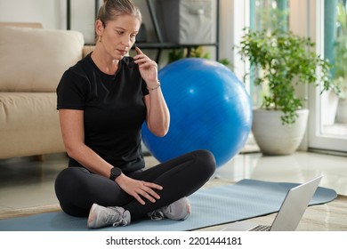 Fitness Instructor Checking Microphone Before Starting Online Fitness Class For Subscribers