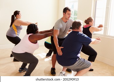 Fitness Instructor In Exercise Class For Overweight People