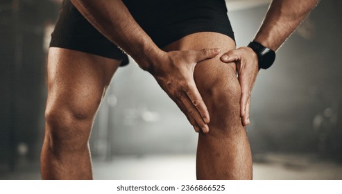 Fitness, knee pain and hands of man at gym for training with muscle, problem or arthritis. Sports, injury and leg of male athlete with joint massage for fibromyalgia, osteoporosis or bone accident - Powered by Shutterstock