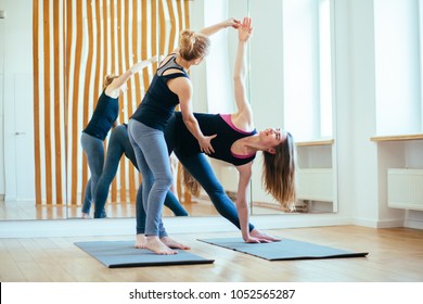 Fitness Lady Beginning Yoga Practice With Private Teacher At Home Class, Working Out With Professional Female Yogi Instructor.