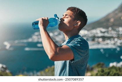 Fitness, man and drinking water outdoor for wellness, body health and nutrition benefits after exercise. Hydration, bottle and thirsty runner in nature with liquid for electrolytes on break or rest - Powered by Shutterstock