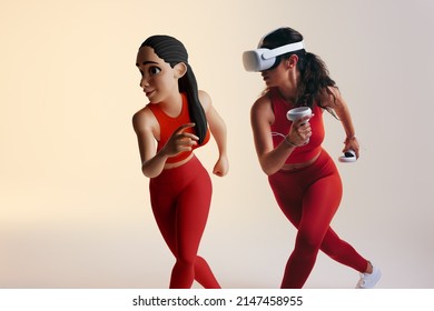 Fitness in the metaverse. Sporty young woman playing a virtual reality fitness game as a 3D avatar. Athletic young woman running with virtual reality goggles and controllers.