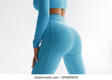 Fitness model in leggings with beautiful buttocks. Sporty booty - Shutterstock ID 1994099870