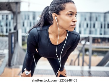 Fitness, motivation and black woman with music in city for wellness, healthy body and cardio workout outdoors. Sports, focus and girl listening to audio for exercise, running and marathon training - Powered by Shutterstock