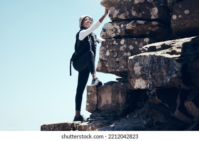 Fitness, Mountain And Woman Rock Climbing In Nature, Smile, Relax And Happy On Morning Workout. Sport, Adrenaline And Exercise With Black Woman Enjoying An Adventure, Climbing And Looking Proud