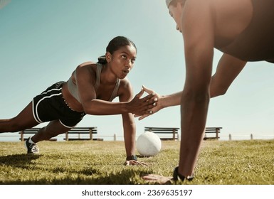 Fitness partner, exercise and sport training with couple workout in a park doing pushup for wellness in nature. Breathing, soccer ball and woman with man personal trainer for strength and health - Powered by Shutterstock