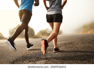 Fitness, people legs and running sport in outdoor for marathon competition with exercise, practice and workout for cardio health. Team and athlete as runner together for performance progress goal