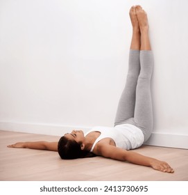 Fitness, pilates and girl stretching on wall with relax for health, wellness and training challenge on floor. Gym workout, exercise and woman in warm up to lose weight, body care and development. - Powered by Shutterstock