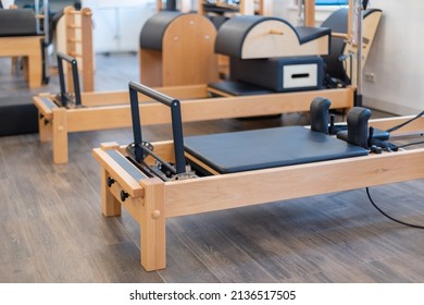 Fitness pilates stretch tables and other exercise equipment in gym. High quality photo - Powered by Shutterstock