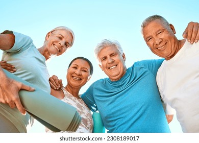 Fitness, portrait and senior friends at yoga outdoor at a wellness, health and spiritual resort. Happy, smile and low angle of a group of elderly people in a huddle at a pilates or meditation class. - Powered by Shutterstock