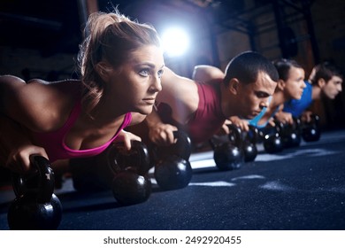 Fitness, push up and group of people with dumbbells, support and commitment to body workout. Bodybuilder, men and women together in exercise class with kettlebell, power training and teamwork in gym - Powered by Shutterstock