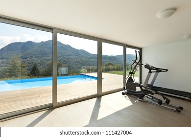 Fitness Room With Pool View