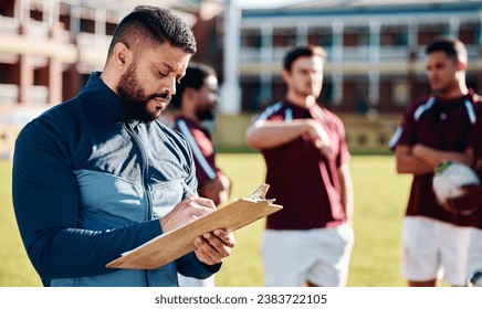 Fitness, rugby and coach with clipboard, teamwork and training for competition, workout and wellness. Male, trainer and group with healthy lifestyle, sports and practice for exercise, support or plan - Powered by Shutterstock