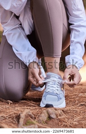 Fitness, runner or hands tie shoes to start workout, sports exercise or cardio training with running footwear. Legs, nature or healthy girl with commitment or motivation ready for exercising wellness