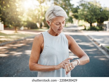 Fitness runner or senior woman with smartwatch check exercise results, process or goal for healthy, wellness lifestyle. Elderly sports person on digital technology typing workout steps or data on arm - Powered by Shutterstock