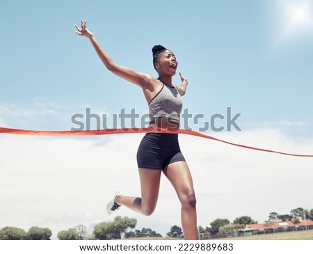 Fitness, runner winner or black woman at finish line for victory, celebration or sport exercise at stadium. Health, winning or running girl for sport, training or workout success for race or marathon