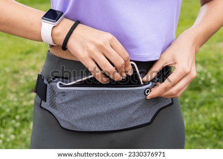 Image, Stock Photo Runner woman getting fanny pack ready for running