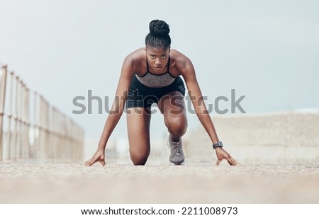 Fitness, runner and woman start running workout along beach, cardio and speed training. Sports, exercise and portrait of black woman prepare for marathon with morning run, serious, focus and intense