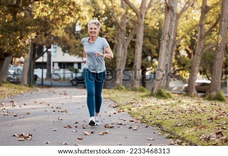 Fitness, running and health with old woman in park for peace, workout and morning jog. Retirement, relax and jogging with senior runner training in nature for endurance, stamina and sports