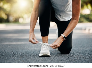 Fitness, Running And Shoes Of Woman In Road For Morning Workout For Health, Wellness And Workout. Sports, Exercise And Energy With Sneakers Of Senior Runner In Neighborhood For Marathon Training