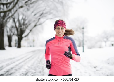 A Fitness Running Woman In Winter Season