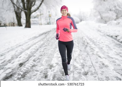 A Fitness Running Woman In Winter Season