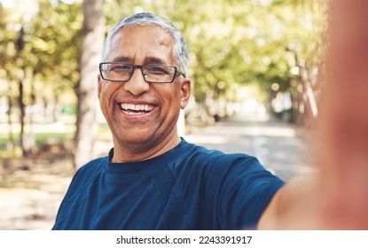 Fitness selfie, senior man and happy in portrait outdoor, vitality and relax after body workout in the park. Smile in picture, freedom and travel with exercise, retirement and happiness in New York. - Powered by Shutterstock