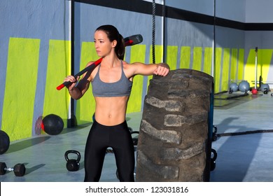 Fitness Sledge Hammer Woman Workout At Gym Relaxed After Exercise