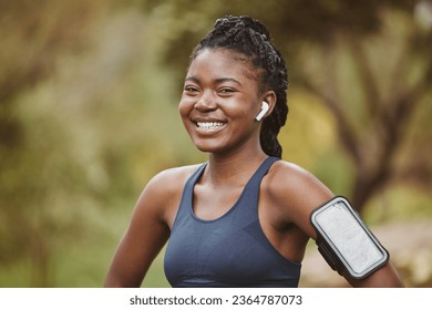 Fitness, smile and portrait of black woman at outdoor exercise, workout or training in a forest for wellness. Happy, confident and young person ready and listening to music, audio or podcast - Shutterstock ID 2364787073