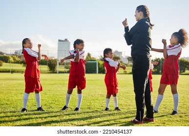 Fitness soccer, girl team and stretching with sport coach on sports field training, exercise or workout. Children, kids or coaching in diversity, teamwork and collaboration on warm up for game. - Powered by Shutterstock