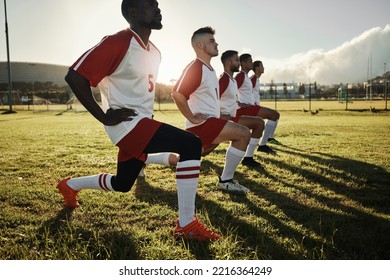 Fitness soccer, men and stretching with sport team on sports field training, exercise or workout. Athlete, group or teamwork in diversity, teamwork and collaboration on warm up for football game - Powered by Shutterstock