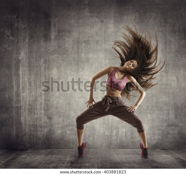 Fitness Sport Dance, Woman Dancer Flying Hair\
Dancing over Concrete\
background