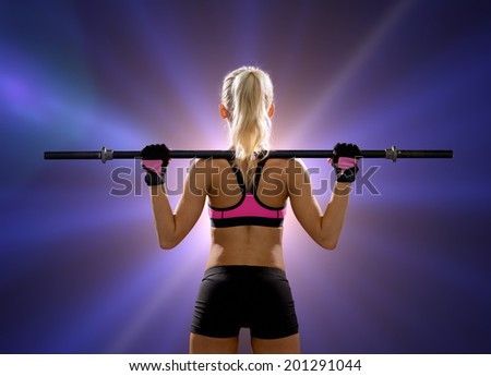 Similar – Rear view portrait of one young athletic woman at crossfit training, exercising with trx suspension fitness straps over dark background