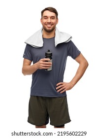 Fitness, Sport And Healthy Lifestyle Concept - Smiling Man In Sports Clothes With Bottle And Towel Over White Background