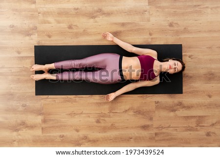 Similar – Woman lying down on a road after accident