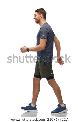 Similar – Image, Stock Photo Side view of fit young woman and man while running side by side on modern electric treadmills at the gym