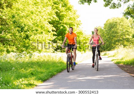 Similar – Image, Stock Photo Young man with bicycle in the sea