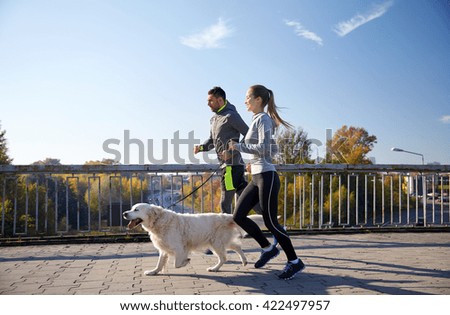 Similar – Foto Bild Labrador mit jungen Frau im Wald