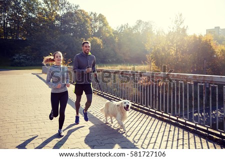 Similar – Foto Bild Labrador mit jungen Frau im Wald