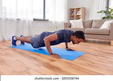 Fitness, Sport, Training And Concept - Indian Man Doing Push Ups At Home