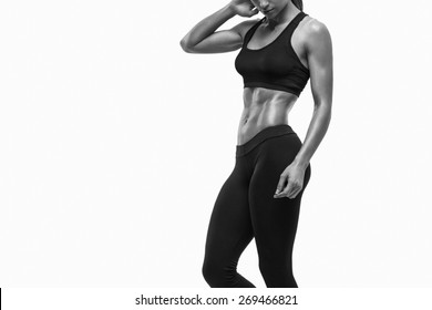 Fitness Sporty Woman Showing Her Well Trained Body. Strong Abs Showing.
