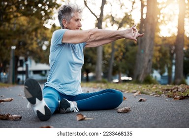 Fitness, stretching and senior woman in a park, training motivation and outdoor workout for energy. Nature exercise, cardio warm up and elderly runner with idea for body performance in retirement - Powered by Shutterstock