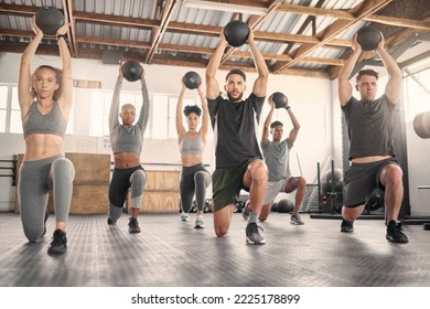 Fitness team, ball and exercise training with workout coach for healthy lifestyle motivation. Sports wellness class, muscle health and body endurance or weight bodybuilder group together on gym floor - Powered by Shutterstock