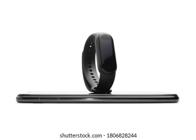 fitness tracker and mobile phone. smart device for healthy lifestyle on white background.