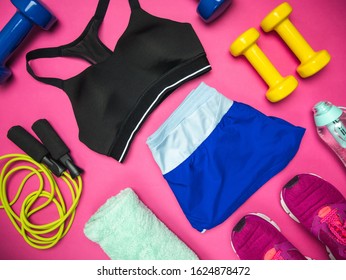 Fitness, Training Workout Equipment Set. Flat Lay Composition On Pink Background.