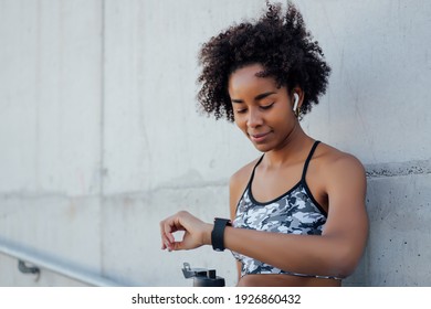 Fitness Woman Checking Time On Smart Watch.