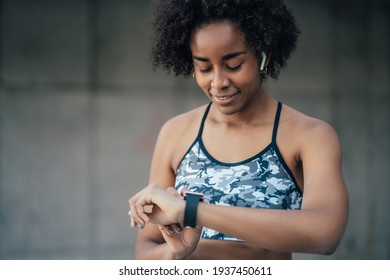 Fitness Woman Checking Time On Smart Watch.