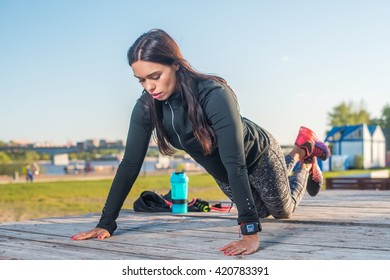 Fitness Woman Doing Knee Push-ups Or Press Ups Exercise Outdoors